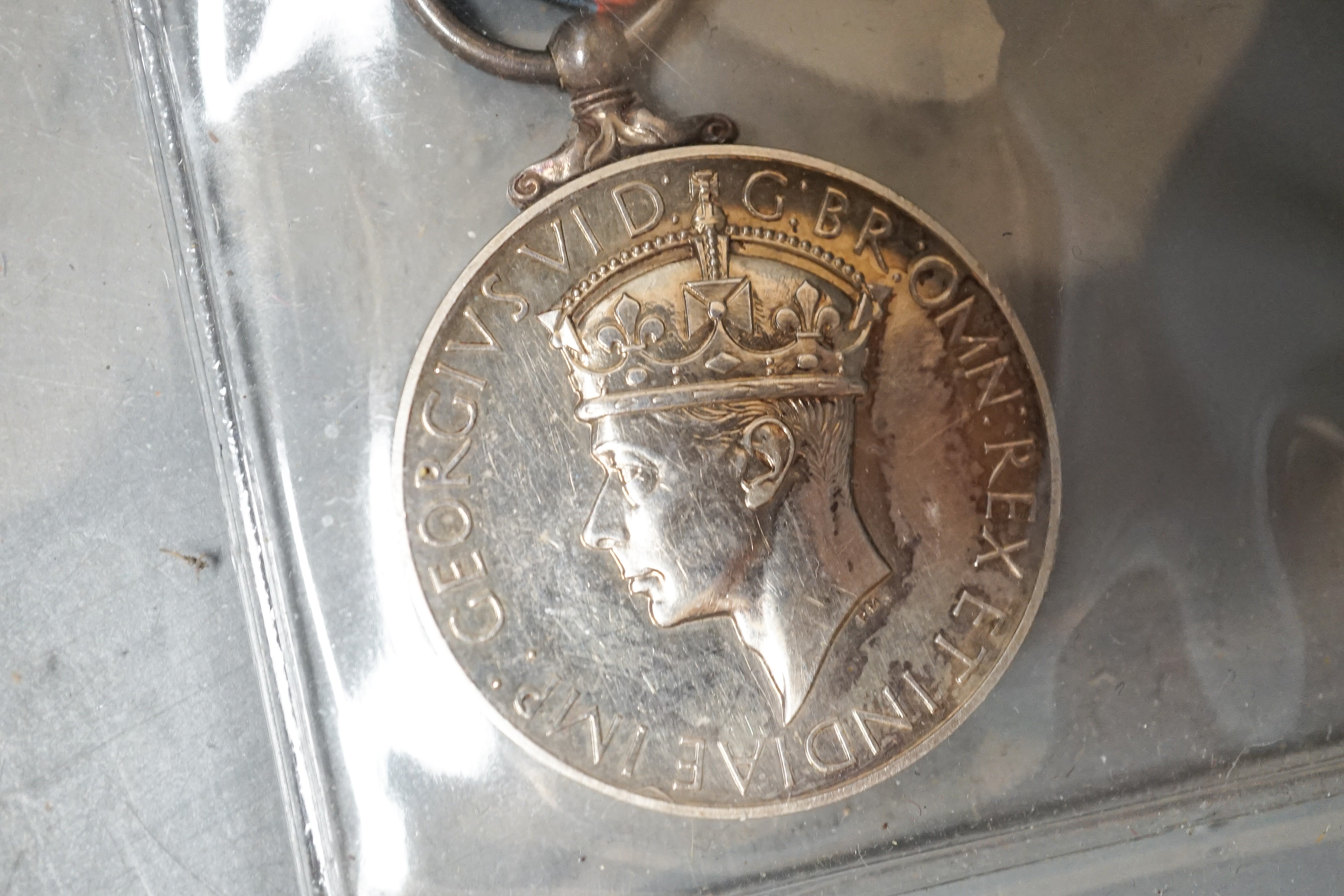 Three Imperial Service medals to Edward James Parker, William Horsfield and Albert Edward Ellis and two Service medals of the Order of St John to 13472 A/SIS.M.TIDMAN.BRISTOL.NO.1.NSG.DIV.NO.2DIS.JAB. 1935 and E692 SGT.